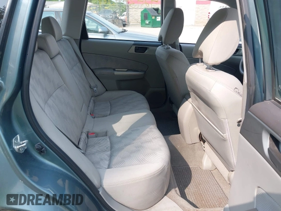 2009 Subaru Forester X с VIN JF2SH61659H738609, выставлен на аукционе IAAI как лот 42434424 с пробегом 218 580 миль миль и . История ставок и продаж доступна на DreamBid. Изображение 8.