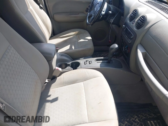 2005 Jeep Liberty Sport with VIN 1J4GL48545W655788, listed as a IAAI auction lot 41914703 with 166,899 mi miles and . Bid and sale history available at carsss.com. Image 5.