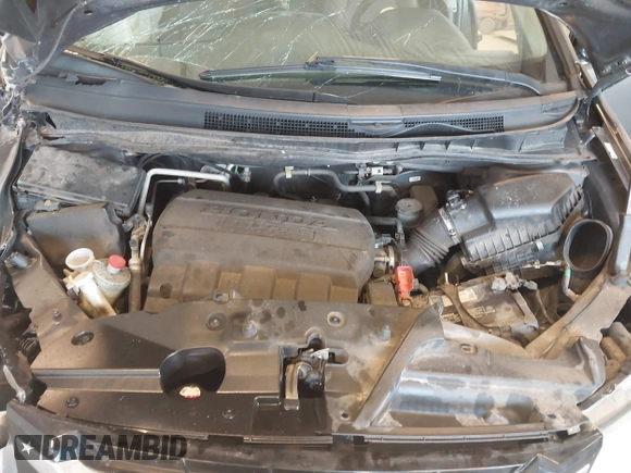 2014 Honda Odyssey Touring with VIN 5FNRL5H99EB105059, listed as a IAAI auction lot 42457672 with 240,581 mi miles and . Bid and sale history available at DreamBid. Image 10.
