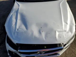 2019 Volvo XC60 R-Design z VIN LYVA22RM8KB230942, wystawiony jako Copart lot #81098054 z przebiegiem Nie podano mil oraz Szkoda całkowita • Salvage title. Historia ofert i sprzedaży dostępna na DreamBid. Obrazek 13.