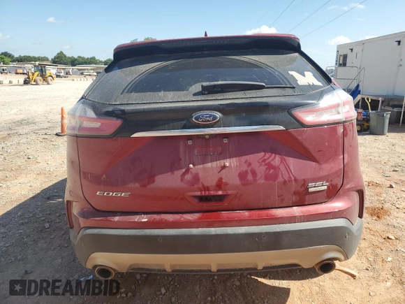 2019 Ford Edge SEL with VIN 2FMPK3J9XKBB38715, listed as a Copart auction lot 62156395 with 125,758 mi miles and Salvage title. Bid and sale history available at DreamBid. Image 6.