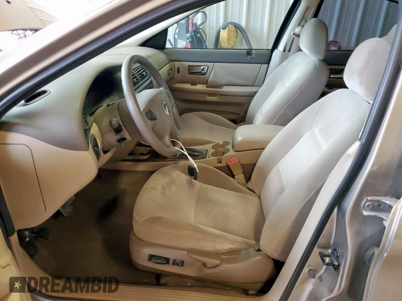 2002 Mercury Sable GS z VIN 1MEFM50U02G652804, wystawiony jako Copart lot #57405035 z przebiegiem 264 042 mil mil oraz Szkody całkowita. Historia ofert i sprzedaży dostępna na DreamBid. Obrazek 7.