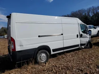 2023 Ram ProMaster Cargo with VIN 3C6MRVJG0PE514388, listed as a Copart auction lot 50252345 with Not Provided miles and Salvage Title. Bid and sale history available at DreamBid. Image 3.
