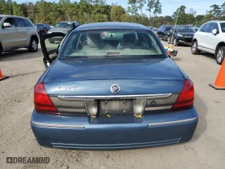 2011 Mercury Grand Marquis LS with VIN 2MEBM7FVXBX608636, listed as a Copart auction lot 82684944 with 157,843 mi miles and Salvage Title. Bid and sale history available at carsss.com. Image 6.