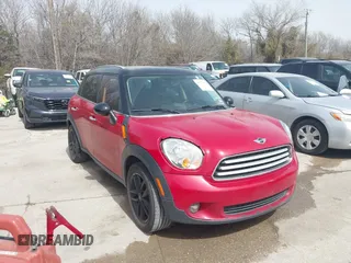 2014 MINI Countryman with VIN WMWZB3C58EWR40140, listed as a IAAI auction lot 41753542 with 200,711 mi miles and . Bid and sale history available at DreamBid. Image 1.