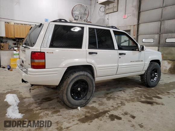1997 Jeep Grand Cherokee Limited with VIN 1J4GZ78Y5VC747553, listed as a Copart auction lot 49125085 with 0 mi miles and Salvage Title. Bid and sale history available at carsss.com. Image 3.