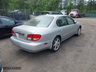 2002 Infiniti I35 Luxury with VIN JNKDA31A02T023642, listed as a IAAI auction lot 42096567 with 94,412 mi miles. Bid and sale history available at carsss.com. Image 4.