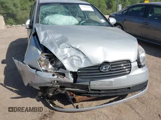 2009 Hyundai Accent Auto GLS z VIN KMHCN46C69U326197, wystawiony jako IAAI lot #42268198 z przebiegiem 74 308 mil mil oraz . Historia ofert i sprzedaży dostępna na DreamBid. Obrazek 6.