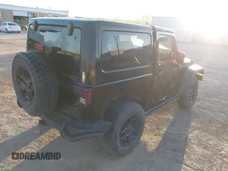 2013 Jeep Wrangler Sahara with VIN 1C4AJWBG8DL565227, listed as a IAAI auction lot 41987087 with 90,644 mi miles and . Bid and sale history available at DreamBid. Image 4.