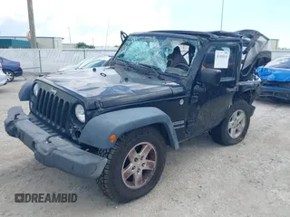 2015 Jeep Wrangler Freedom Edition with VIN 1C4AJWAG4FL681688, listed as a IAAI auction lot 42488018 with Not provided miles and . Bid and sale history available at DreamBid. Image 17.