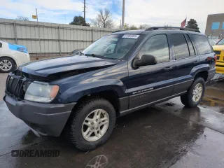 2004 Jeep Grand Cherokee Laredo with VIN 1J4GW48S84C200259, listed as a Copart auction lot 51002325 with 158,193 mi miles and Salvage Title. Bid and sale history available at carsss.com. Image 1.