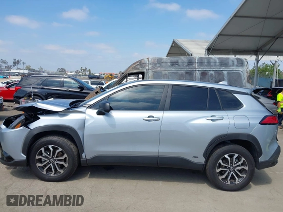 2023 Toyota Corolla Cross Hybrid S with VIN 7MUFBABG1PV014992, listed as a IAAI auction lot 42202656 with 18,913 mi miles and . Bid and sale history available at DreamBid. Image 14.