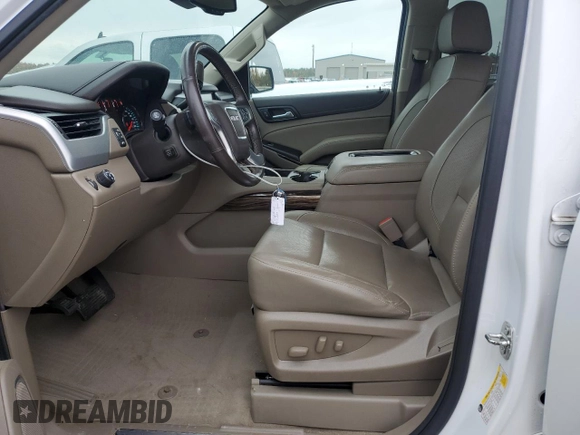 2020 GMC Yukon SLT with VIN 1GKS1BKC3LR168874, listed as a Copart auction lot 82103464 with 79,220 mi miles and Salvage Title. Bid and sale history available at DreamBid. Image 7.
