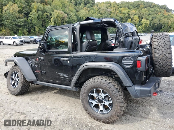 2023 Jeep Wrangler Rubicon with VIN 1C4HJXCGXPW545938, listed as a Copart auction lot 73939634 with 13,590 mi miles and Salvage title. Bid and sale history available at DreamBid. Image 2.