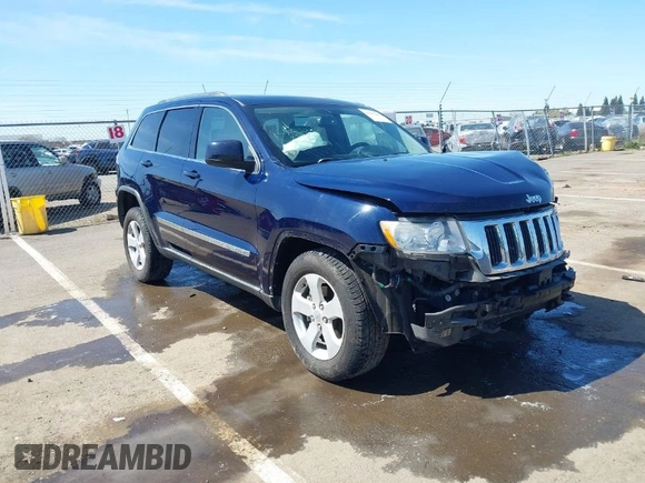 2012 Jeep Grand Cherokee Laredo with VIN 1C4RJFAG0CC160255, listed as a IAAI auction lot 41967809 with 127,702 mi miles. Bid and sale history available at carsss.com. Image 1.