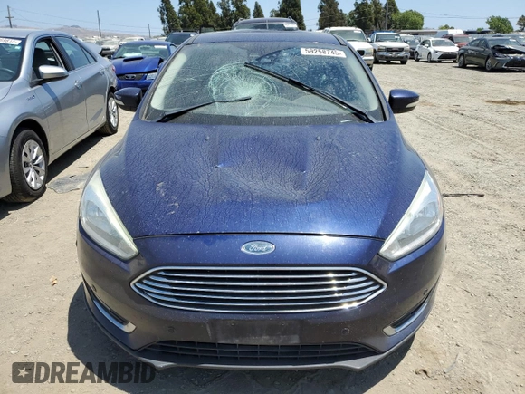 2016 Ford Focus Titanium z VIN 1FADP3J2XGL319399, wystawiony jako Copart lot #59258745 z przebiegiem 215 296 mil mil oraz Szkoda całkowita • Salvage title. Historia ofert i sprzedaży dostępna na DreamBid. Obrazek 5.