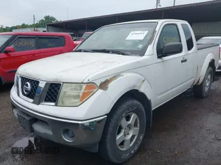 2005 Nissan Frontier LE with VIN 1N6AD06W65C451098, listed as a IAAI auction lot 42464911 with 161,902 mi miles and . Bid and sale history available at DreamBid. Image 2.