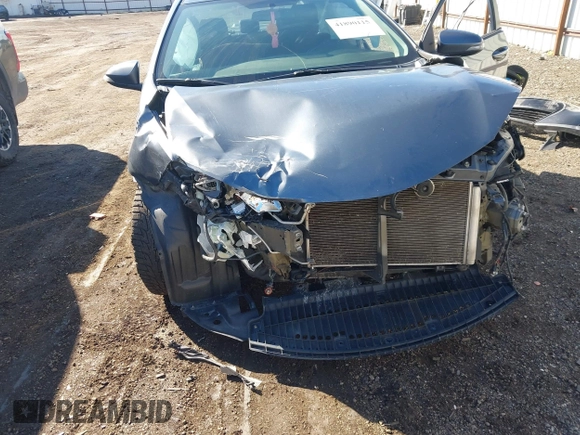 2014 Toyota Corolla L with VIN 5YFBURHE2EP040286, listed as a IAAI auction lot 41890115 with 154,584 mi miles and . Bid and sale history available at DreamBid. Image 6.