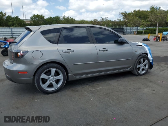 2005 Mazda 3 s with VIN JM1BK343051338251, listed as a Copart auction lot 54321465 with 106,183 mi miles and Salvage Title. Bid and sale history available at DreamBid. Image 3.