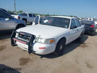 2011 Ford Police Interceptor with VIN 2FABP7BV3BX181983, listed as a IAAI auction lot 42010851 with 101,737 mi miles. Bid and sale history available at carsss.com. Image 2.