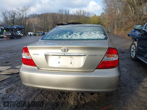 2003 Toyota Camry LE with VIN 4T1BE30K13U705105, listed as a IAAI auction lot 41696395 with 191,389 mi miles and . Bid and sale history available at DreamBid. Image 16.