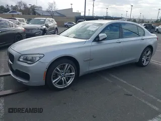 2015 BMW 7 Series 750Li with VIN WBAYE8C5XFD782039, listed as a IAAI auction lot 41505626 with 74,716 mi miles. Bid and sale history available at carsss.com. Image 2.
