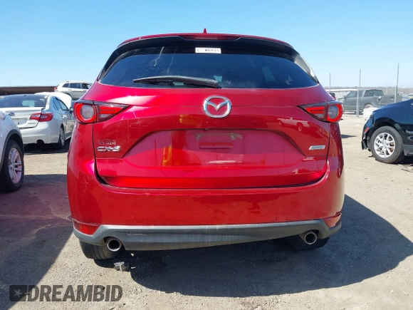 2019 Mazda CX-5 Grand Touring with VIN JM3KFADM5K1556917, listed as a IAAI auction lot 41706323 with 77,804 mi miles. Bid and sale history available at carsss.com. Image 16.
