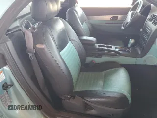 2002 Ford Thunderbird Hardtop Premium z VIN 1FAHP60A22Y109399, wystawiony jako Copart lot #61760324 z przebiegiem 137 158 mil mil oraz Szkoda całkowita • Salvage title. Historia ofert i sprzedaży dostępna na DreamBid. Obrazek 10.