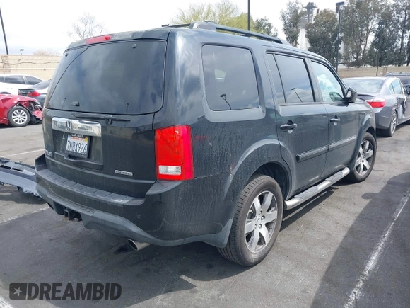 2012 Honda Pilot Touring with VIN 5FNYF3H9XCB008456, listed as a IAAI auction lot 41923004 with Not Provided miles and . Bid and sale history available at DreamBid. Image 4.