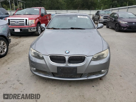 2010 BMW 3 Series 335i with VIN WBAWL7C50AP476272, listed as a Copart auction lot 74719554 with 77,117 mi miles and Salvage Title. Bid and sale history available at carsss.com. Image 5.
