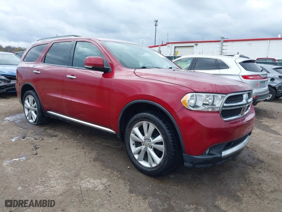 2013 Dodge Durango Crew with VIN 1C4RDJDG8DC540399, listed as a IAAI auction lot 42041455 with 126,435 mi miles. Bid and sale history available at carsss.com. Image 1.