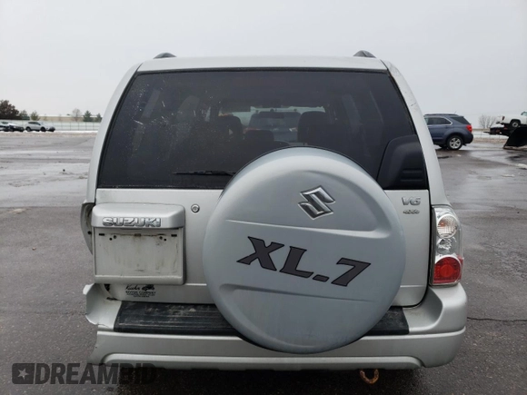 2005 Suzuki XL7 LX with VIN JS3TX92V054108383, listed as a Copart auction lot 85280414 with 128,594 mi miles and Salvage title. Bid and sale history available at DreamBid. Image 6.