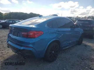 2017 BMW X4 M40i with VIN 5UXXW7C58H0U25599, listed as a Copart auction lot 61489334 with 115,001 mi miles and Salvage Title. Bid and sale history available at carsss.com. Image 3.