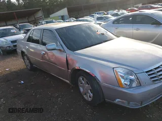 2006 Cadillac DTS 1SC z VIN 1G6KD57Y26U104838, wystawiony jako IAAI lot #41280412 z przebiegiem 172 494 mil mil oraz . Historia ofert i sprzedaży dostępna na DreamBid. Obrazek 6.
