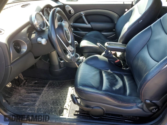 2006 MINI Convertible S with VIN WMWRH33566TJ42639, listed as a Copart auction lot 49452255 with 81,733 mi miles and Salvage title. Bid and sale history available at DreamBid. Image 7.