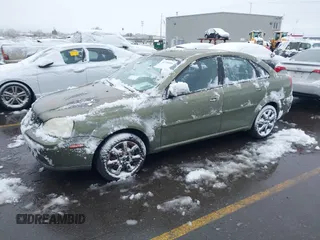 2004 Suzuki Forenza S z VIN KL5JD52Z64K027219, wystawiony jako IAAI lot #41799510 z przebiegiem Nie podano mil oraz . Historia ofert i sprzedaży dostępna na DreamBid. Obrazek 2.