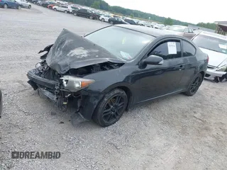 2007 Scion tC Spec with VIN JTKDE167970178053, listed as a IAAI auction lot 42493614 with 284,596 mi miles and . Bid and sale history available at DreamBid. Image 2.