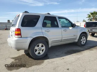 2006 Ford Escape Hybrid with VIN 1FMCU95H56KB21880, listed as a Copart auction lot 52235915 with 217,628 mi miles and Clean title. Bid and sale history available at DreamBid. Image 3.