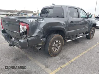 2018 Toyota Tacoma SR5 with VIN 3TMAZ5CN1JM071396, listed as a IAAI auction lot 42061640 with 122,148 mi miles and . Bid and sale history available at DreamBid. Image 4.