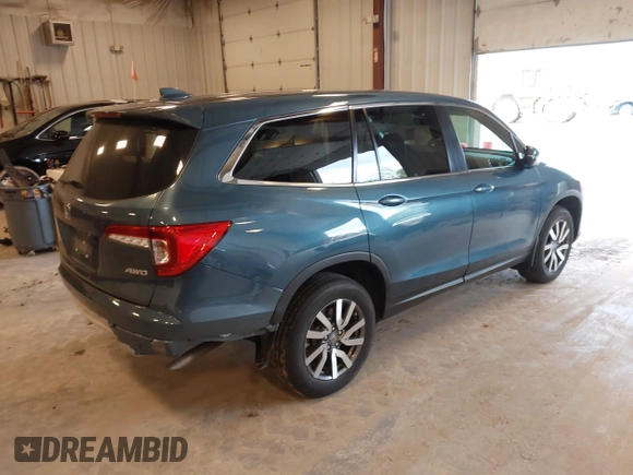 2021 Honda Pilot EX-L z VIN 5FNYF6H54MB082455, wystawiony jako IAAI lot #42343787 z przebiegiem 25 954 mil mil oraz . Historia ofert i sprzedaży dostępna na DreamBid. Obrazek 4.