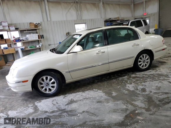 2004 Kia Amanti z VIN KNALD124145035031, wystawiony jako Copart lot #81294924 z przebiegiem 136 941 mil mil oraz Czysty tytuł • Clean title. Historia ofert i sprzedaży dostępna na DreamBid. Obrazek 1.
