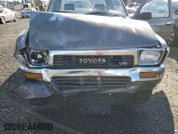 1989 Toyota Pickup DLX z VIN JT4VN13D0K0001910, wystawiony jako Copart lot #77413274 z przebiegiem 311 223 mil mil oraz Szkoda całkowita • Salvage title. Historia ofert i sprzedaży dostępna na DreamBid. Obrazek 11.