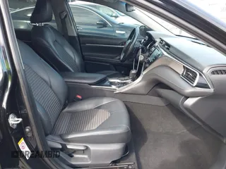 2018 Toyota Camry LE z VIN 4T1B11HK2JU002873, wystawiony jako IAAI lot #41637537 z przebiegiem 136 950 mil mil oraz . Historia ofert i sprzedaży dostępna na DreamBid. Obrazek 5.