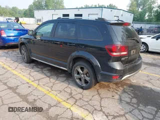 2015 Dodge Journey Crossroad with VIN 3C4PDDGG6FT740760, listed as a IAAI auction lot 42428742 with 215,219 mi miles and . Bid and sale history available at DreamBid. Image 3.