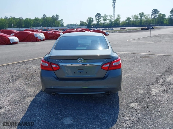 2016 Nissan Altima 2.5 SR with VIN 1N4AL3AP3GC186902, listed as a IAAI auction lot 39780328 with 142,952 mi miles. Bid and sale history available at carsss.com. Image 16.
