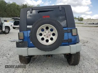2009 Jeep Wrangler Unlimited Rubicon with VIN 1J4GA69169L762992, listed as a Copart auction lot 51674355 with 147,181 mi miles and Salvage title. Bid and sale history available at DreamBid. Image 6.