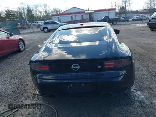 2023 Nissan Z Sport с VIN JN1BZ4AH6PM312226, выставлен на аукционе IAAI как лот 41659805 с пробегом 9 378 миль миль и . История ставок и продаж доступна на DreamBid. Изображение 16.