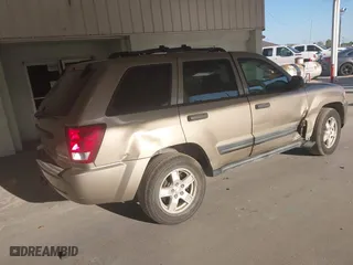 2005 Jeep Grand Cherokee Laredo with VIN 1J8HR48N95C713185, listed as a IAAI auction lot 41777242 with 95,262 mi miles. Bid and sale history available at carsss.com. Image 4.