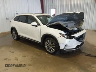 2018 Mazda CX-9 Grand Touring z VIN JM3TCBDY2J0210723, wystawiony jako IAAI lot #41999755 z przebiegiem 109 969 mil mil oraz . Historia ofert i sprzedaży dostępna na DreamBid. Obrazek 1.