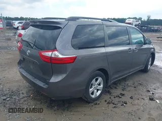 2017 Toyota Sienna LE Auto Access Seat with VIN 5TDKZ3DCXHS818669, listed as a IAAI auction lot 42198544 with 112,871 mi miles. Bid and sale history available at carsss.com. Image 4.